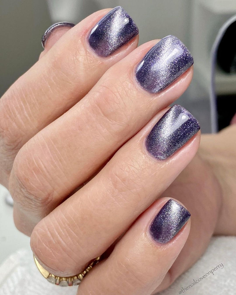 Purple cat eye gel nail polish