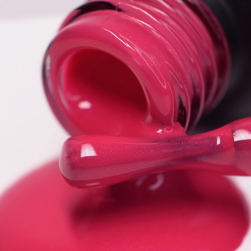 Close up of pink / red gel nail polish for a Russian pedicure or manicure
