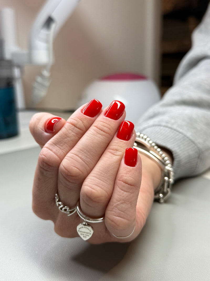 PNB 334 red gel nail polish with a Russian manicure