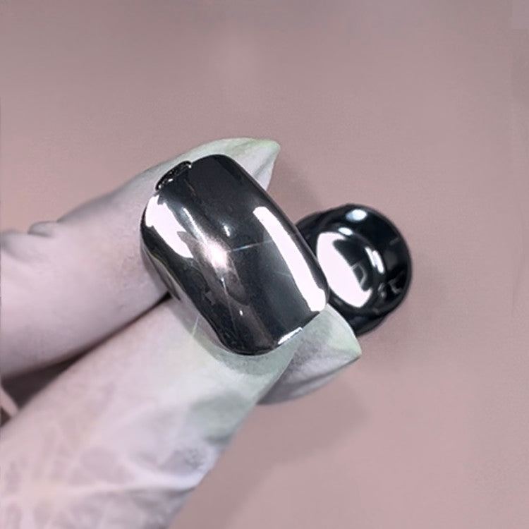 Metallic nail polish on a swatch. Silver chrome nails