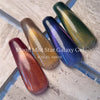 Four chrome gel polish swatches in burgundy, bronze, blue, and green with long coffin nails by ICEGEL MADE