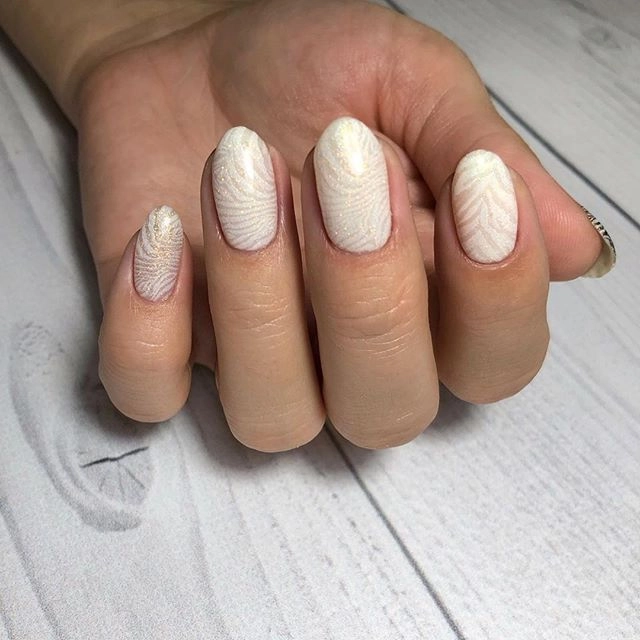 Manicure created with Swanky Stamping nail plates