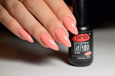 PNB coral pink gel nail polish for manicures and pedicures. Simple elegant nails with a single color